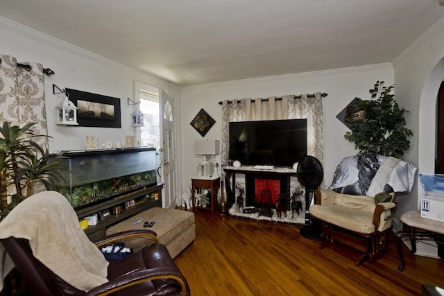 320 Oakland St, Springfield, MA 01108 - living area featuring wood finished floors, crown molding, and arched walkways
