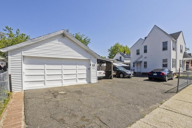 320 Oakland St, Springfield, MA 01108 - view of front of property with a garage and an outdoor structure