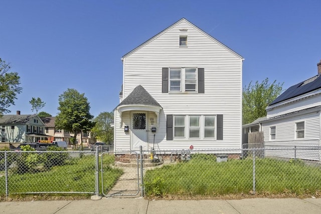 320 Oakland St, Springfield, MA 01108 - view of front of property featuring a gate