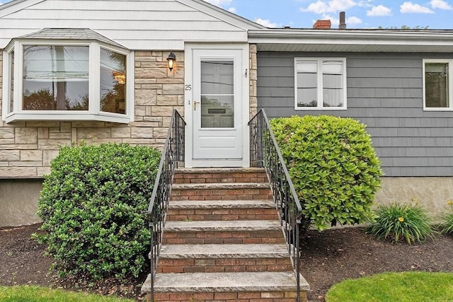 25 Ocallaghan Way, Lynn, MA 01905 - property entrance featuring stone siding and a chimney
