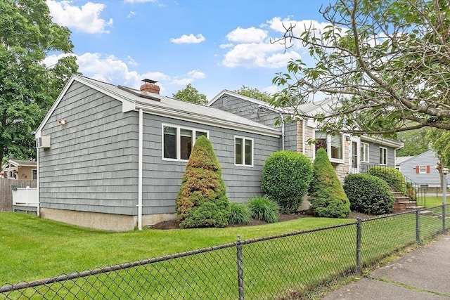 25 Ocallaghan Way, Lynn, MA 01905 - view of home's exterior with a chimney