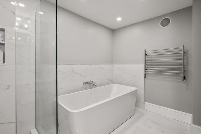 33 Commercial Wharf Unit 33A, Boston, MA 02110 - full bathroom with a towel warming rack, marble finish floors, radiator, a freestanding tub, and recessed lighting