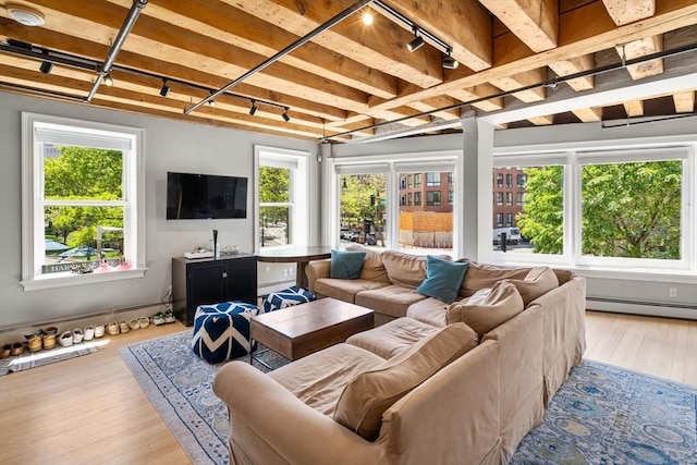 33 Commercial Wharf Unit 33A, Boston, MA 02110 - sunroom / solarium featuring a baseboard heating unit, beam ceiling, and rail lighting
