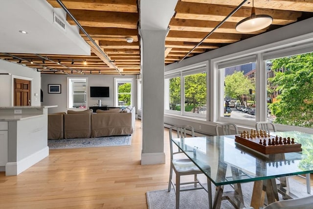 33 Commercial Wharf Unit 33A, Boston, MA 02110 - dining area featuring baseboards and light wood-style flooring