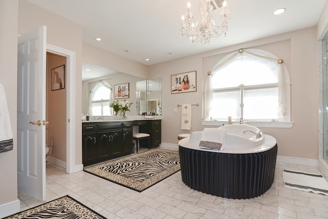 bathroom featuring vanity and shower with separate bathtub