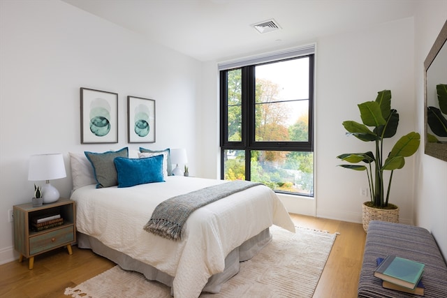 bedroom featuring light wood-type flooring