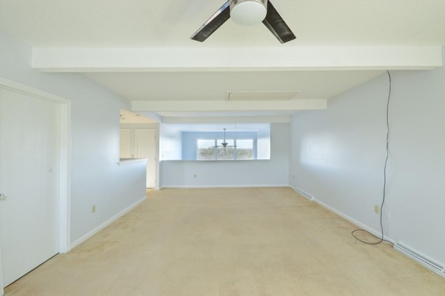 unfurnished living room featuring beamed ceiling, carpet floors, and ceiling fan