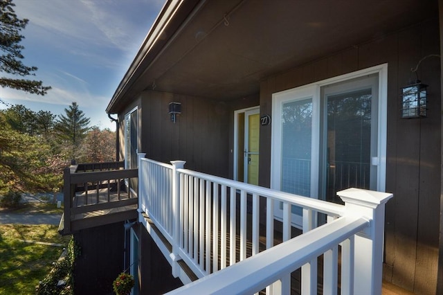 wooden balcony featuring a deck