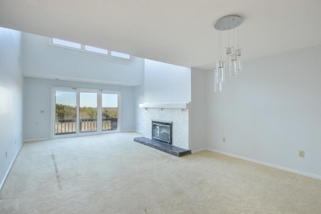 unfurnished living room featuring light carpet