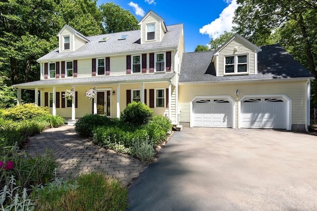 3 Centennial Dr, Blackstone, MA 01504 - view of front facade featuring a garage, aphalt driveway, covered porch, and a shingled roof