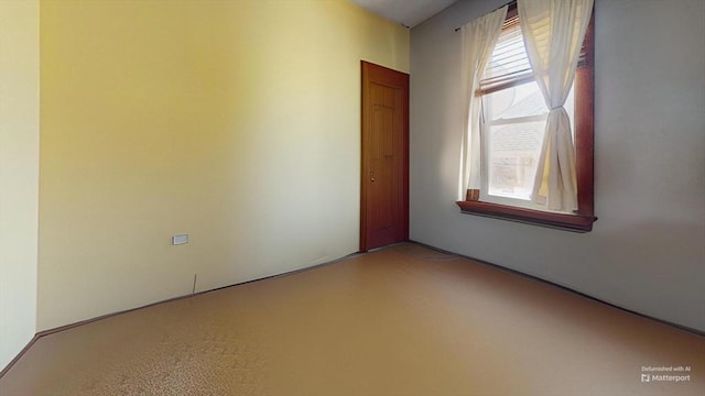 spare room featuring plenty of natural light