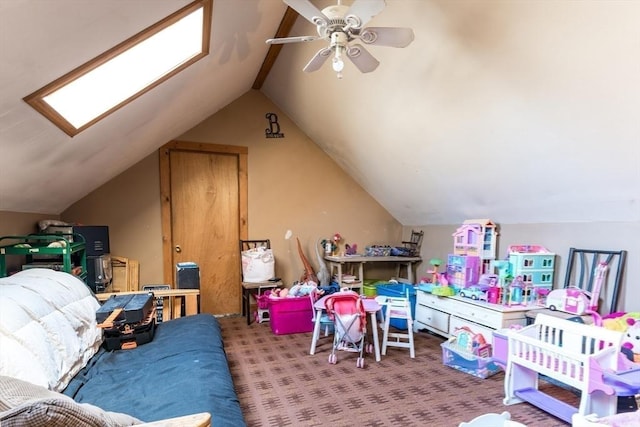 playroom featuring vaulted ceiling, carpet floors, and ceiling fan