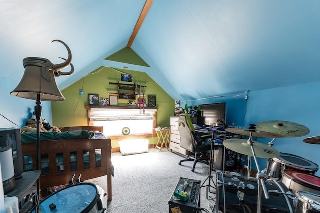 carpeted bedroom with lofted ceiling