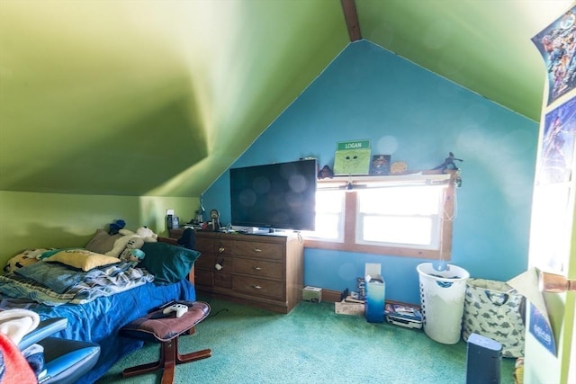 bedroom with vaulted ceiling and carpet