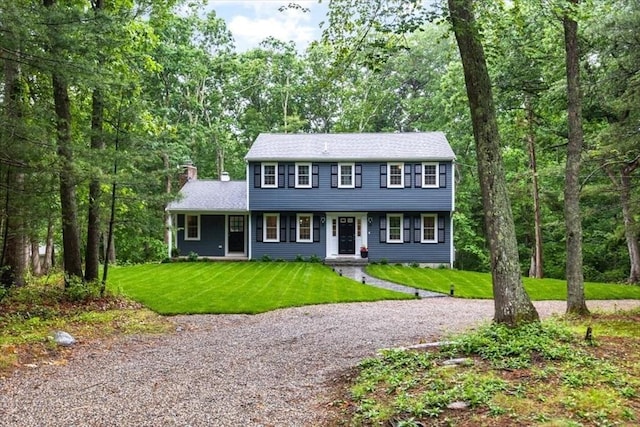 98 Old Forge Rd, Scituate, MA 02066 - colonial house with a chimney, a front lawn, and roof with shingles