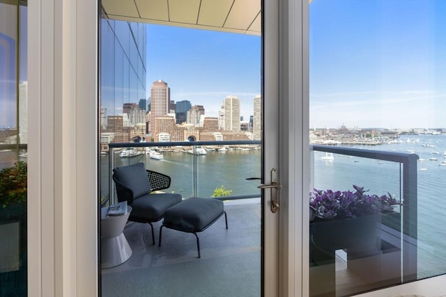 balcony featuring a water view