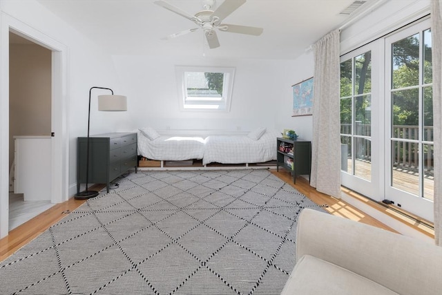 28 Marthas Rd, Edgartown, MA 02539 - bedroom featuring multiple windows, light wood-type flooring, and a ceiling fan