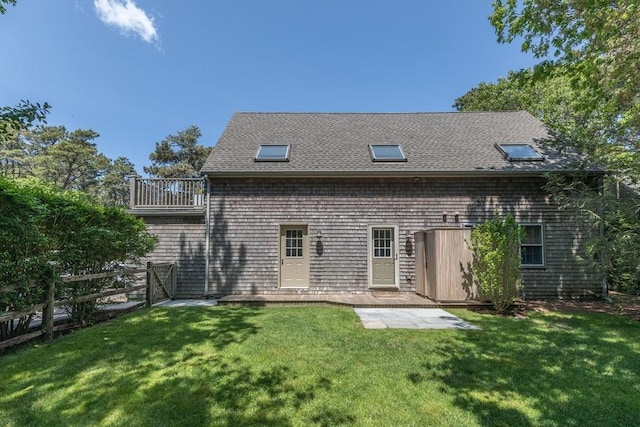 28 Marthas Rd, Edgartown, MA 02539 - rear view of property featuring roof with shingles