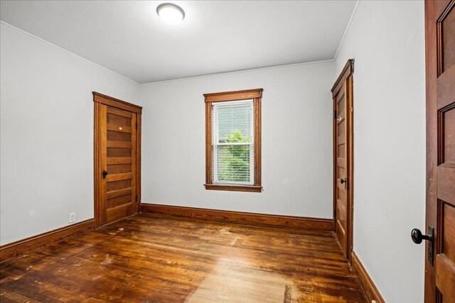 29 Tatman St, Worcester, MA 01607 - empty room with hardwood / wood-style floors, baseboards, and crown molding