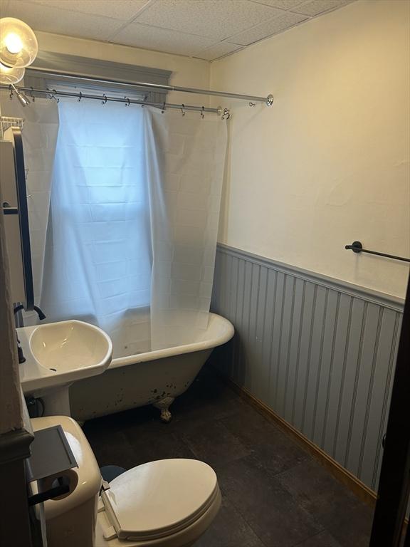 29 Tatman St, Worcester, MA 01607 - full bathroom featuring wainscoting, shower / bath combo, and toilet