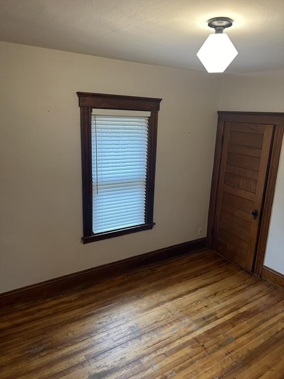 29 Tatman St, Worcester, MA 01607 - spare room with wood finished floors and baseboards