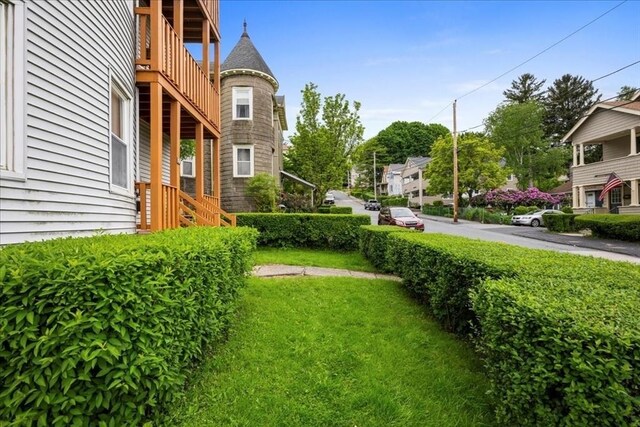 29 Tatman St, Worcester, MA 01607 - view of green lawn with a balcony