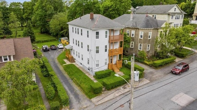 29 Tatman St, Worcester, MA 01607 - view of subject property with a tree filled landscape