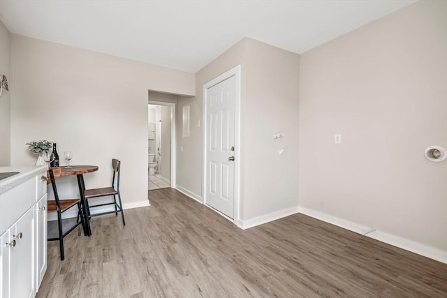 45 Stanley St, Lowell, MA 01850 - office area featuring light wood-style flooring and baseboards