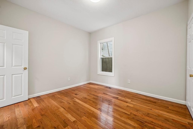 45 Stanley St, Lowell, MA 01850 - empty room with light wood-style flooring