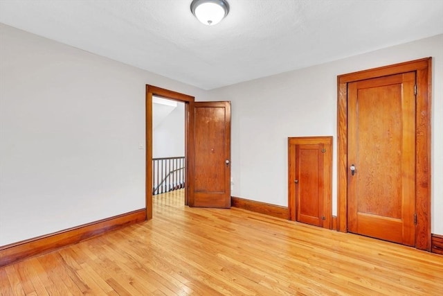 empty room with light wood-type flooring