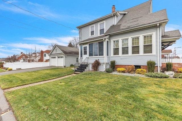 front facade featuring a front lawn