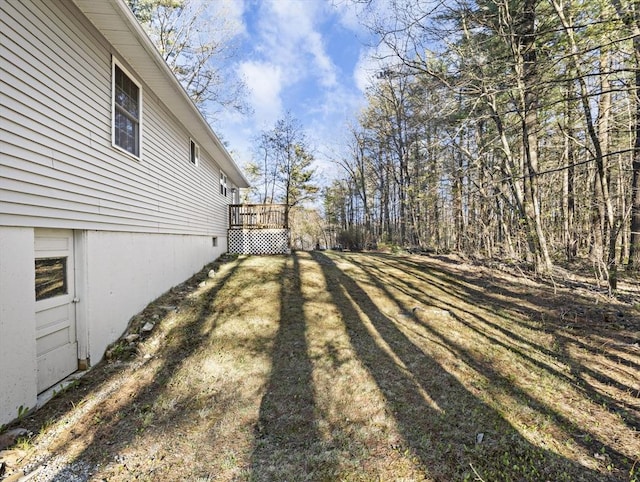 view of yard featuring a deck