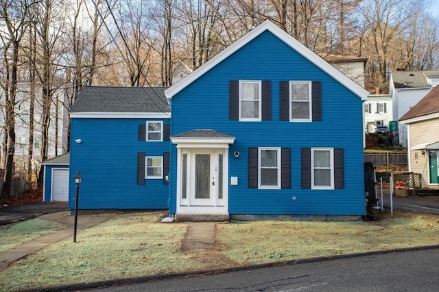 70 Sanborn St, Fitchburg, MA 01420 - view of front of home featuring driveway and a front yard