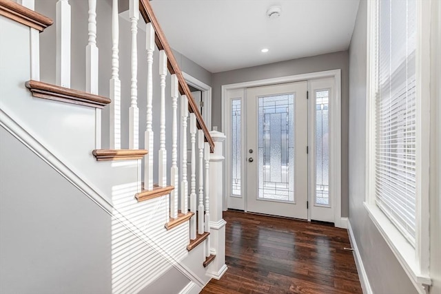 70 Sanborn St, Fitchburg, MA 01420 - foyer entrance with stairway, dark wood finished floors, recessed lighting, and baseboards