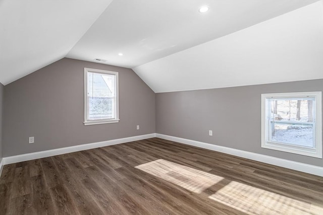70 Sanborn St, Fitchburg, MA 01420 - additional living space with lofted ceiling, baseboards, dark wood-style floors, and recessed lighting