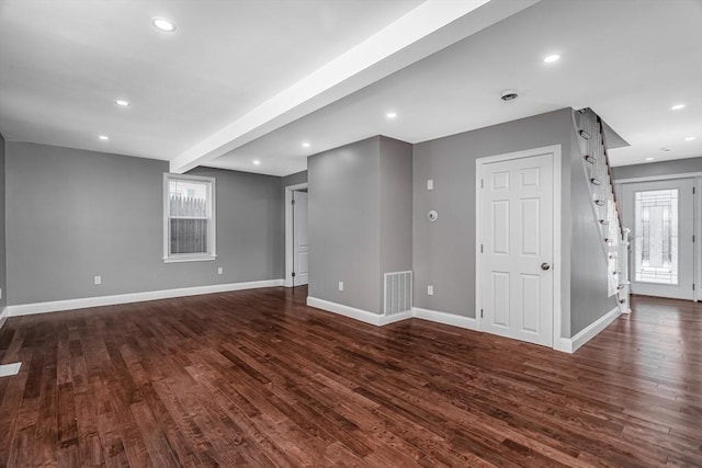 70 Sanborn St, Fitchburg, MA 01420 - unfurnished room with dark wood-style floors, baseboards, recessed lighting, and beam ceiling