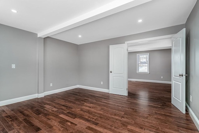 70 Sanborn St, Fitchburg, MA 01420 - unfurnished room featuring dark wood-style flooring, baseboards, and recessed lighting