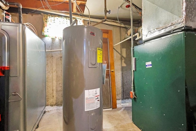 utility room featuring electric water heater and heating unit