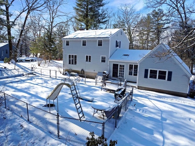 view of snow covered property