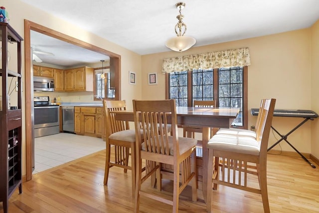 dining room featuring light wood-type flooring