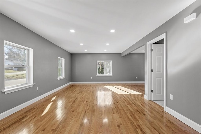 unfurnished room featuring light hardwood / wood-style floors