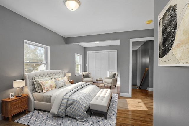 bedroom with wood-type flooring