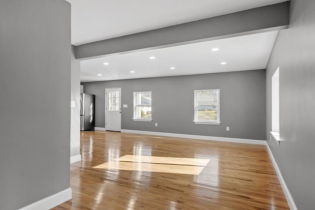 unfurnished room featuring light wood-type flooring