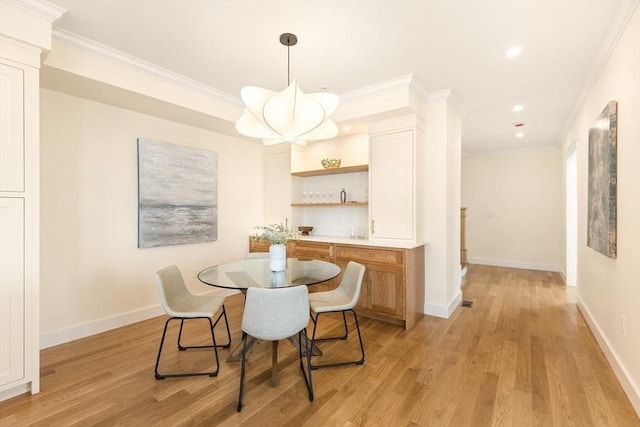 3 Colburn St Unit 1, Gloucester, MA 01930 - dining room with light wood-style flooring, ornamental molding, and recessed lighting