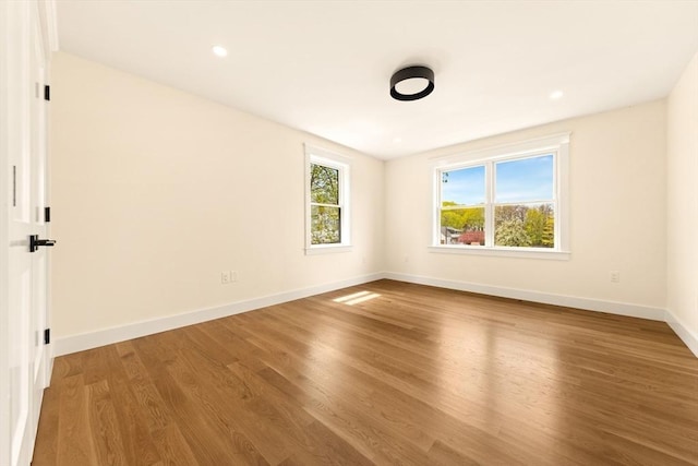 3 Colburn St Unit 1, Gloucester, MA 01930 - spare room with wood finished floors and recessed lighting