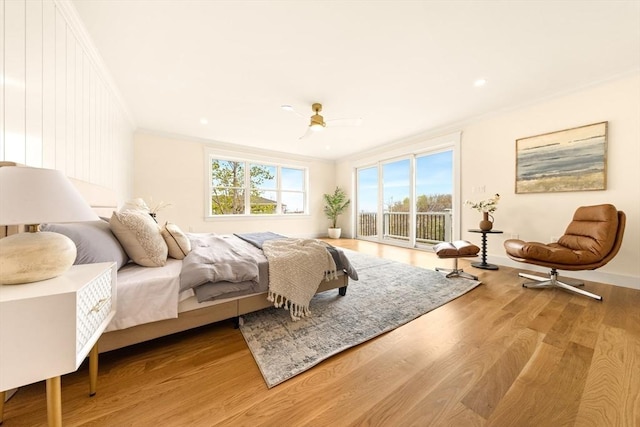 3 Colburn St Unit 1, Gloucester, MA 01930 - bedroom with access to exterior, crown molding, wood finished floors, ceiling fan, and recessed lighting