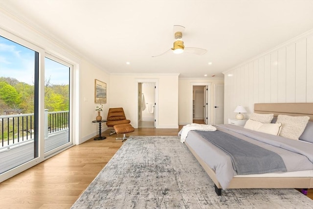 3 Colburn St Unit 1, Gloucester, MA 01930 - bedroom featuring access to outside, ornamental molding, wood finished floors, and ceiling fan
