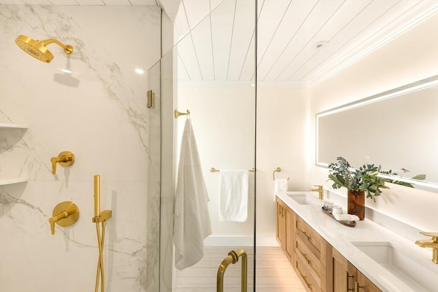 3 Colburn St Unit 1, Gloucester, MA 01930 - bathroom with a marble finish shower, double vanity, and ornamental molding