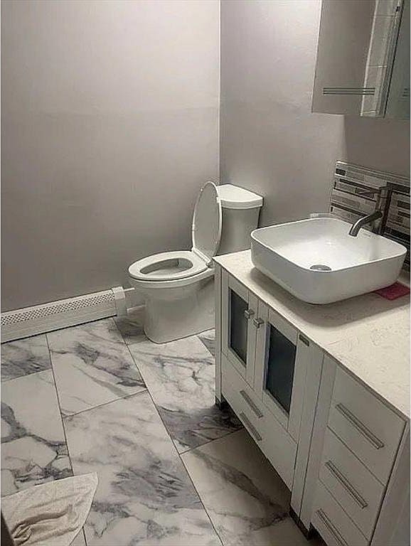 5 Hallmark Gdns Unit 6, Burlington, MA 01803 - half bath featuring marble look tile flooring and vanity