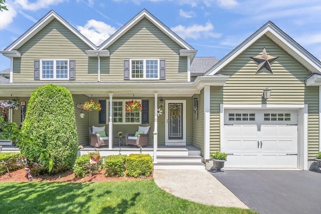 1 Woodland Ct Unit B, Milford, MA 01757 - traditional-style house featuring a porch, a garage, and driveway